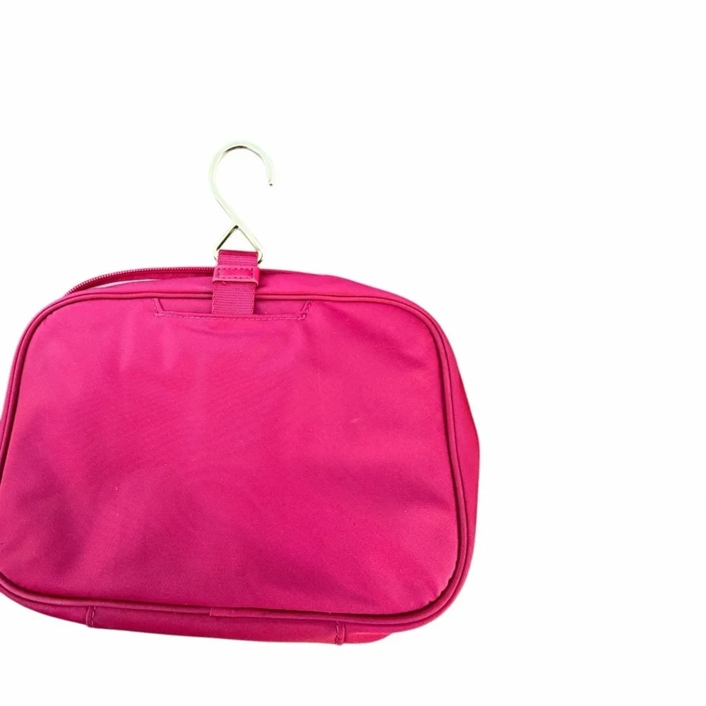 Tumi pink hanging